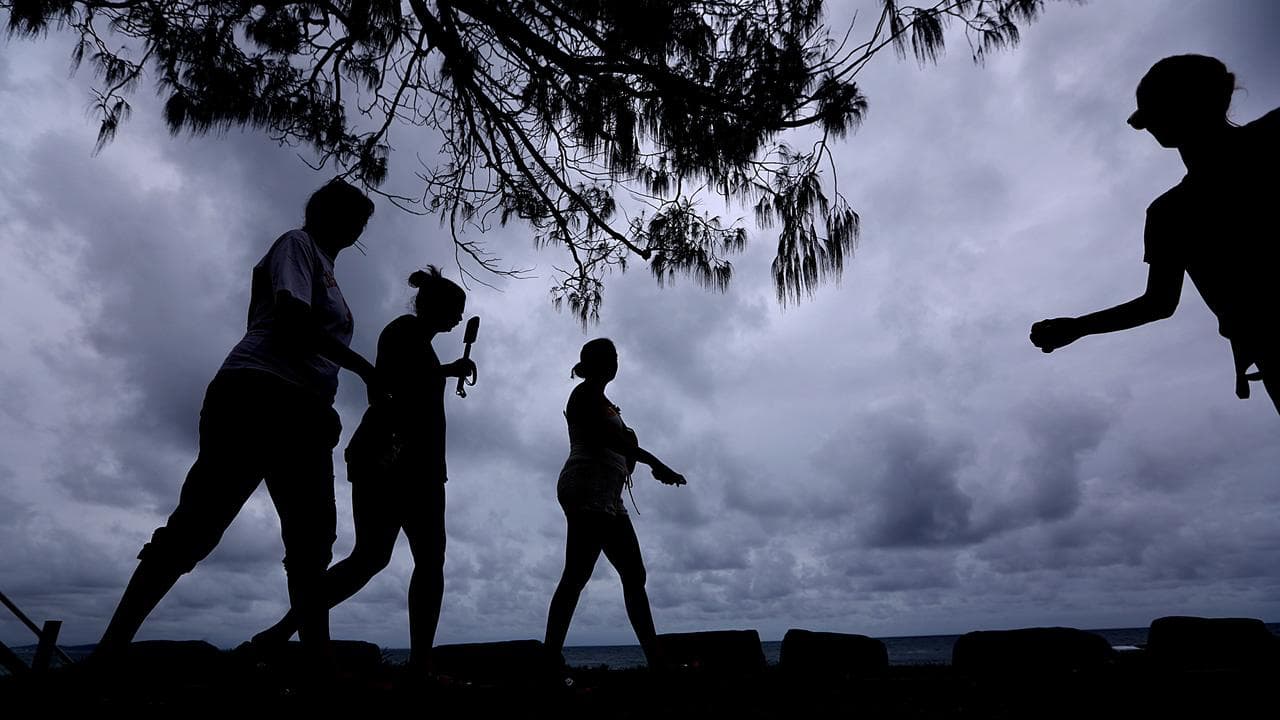 People brave the rain