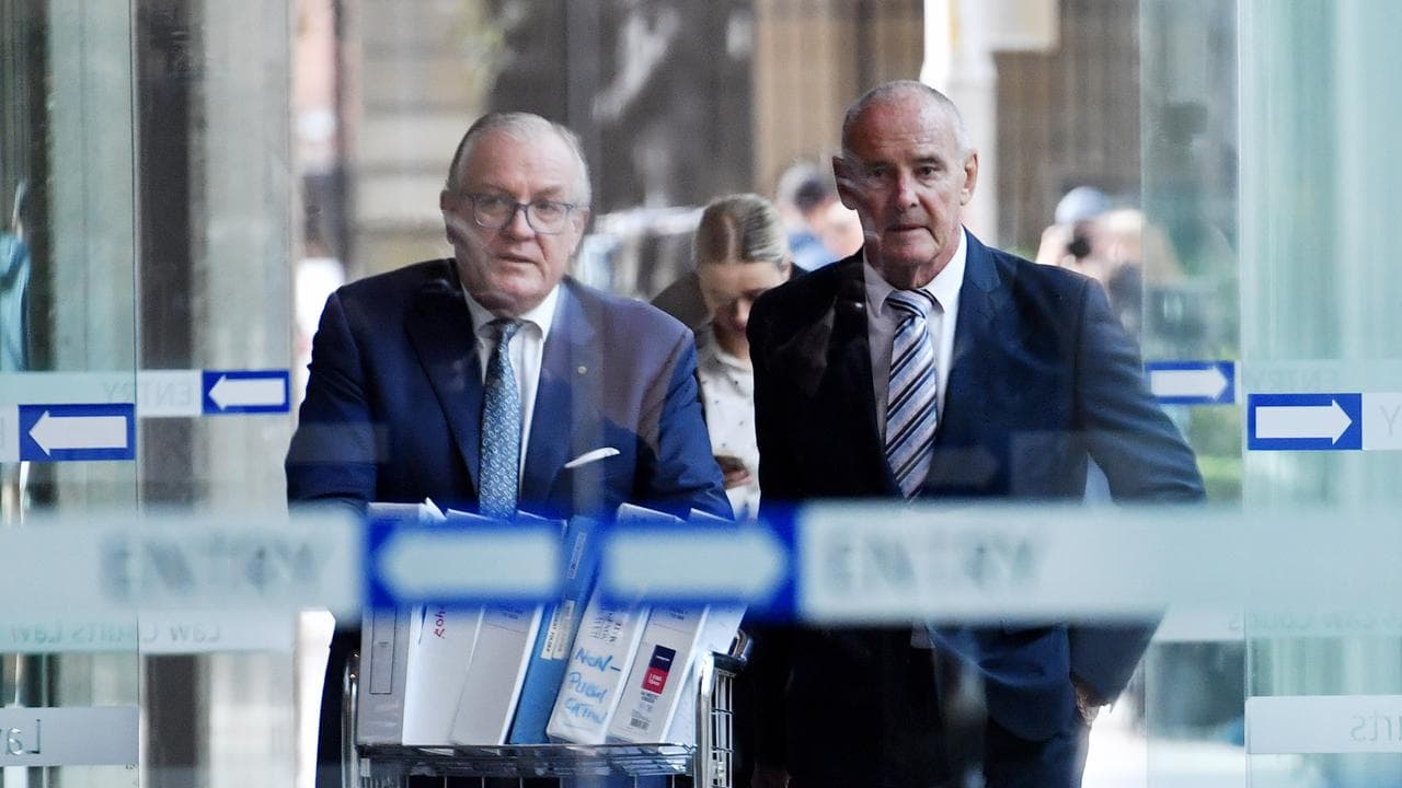 Chris Dawson (right, file)