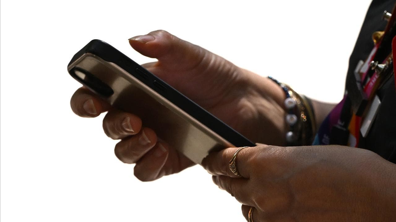 woman seen using a smartphone