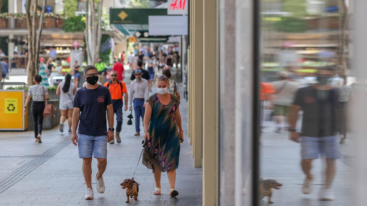 People wearing masks in Brisbane during COVID-19 pandemic.