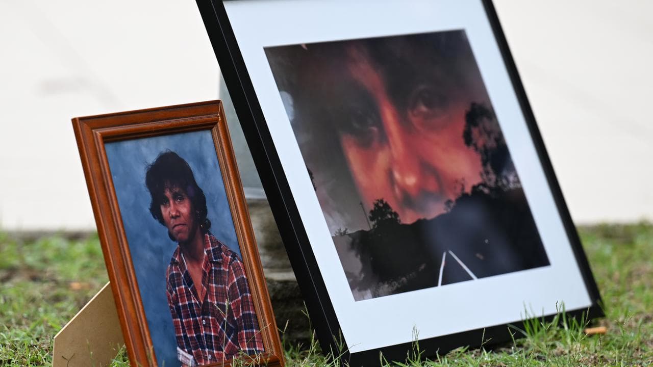 Framed portraits of Mark Haines