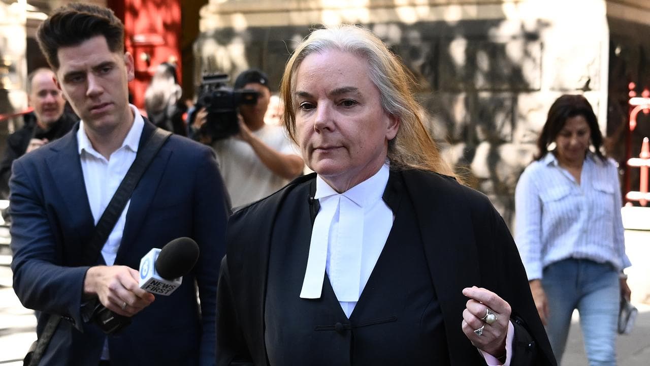 Barrister Julie Condon (centre)