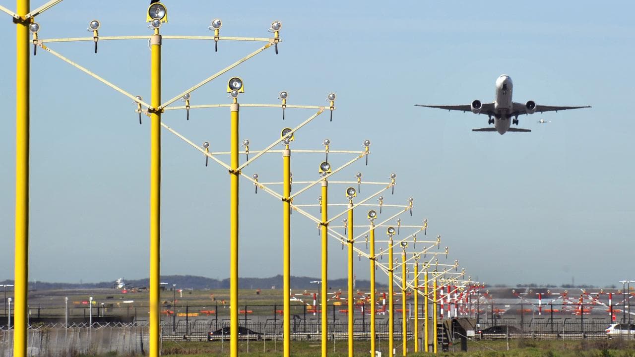 Aircraft taking off from Sydney International Airport (stock)