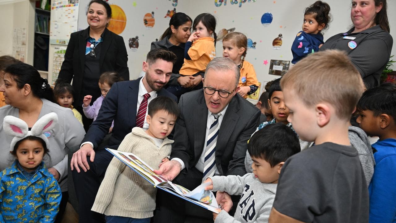 Anthony Albanese reads a book to children in Croydon South.