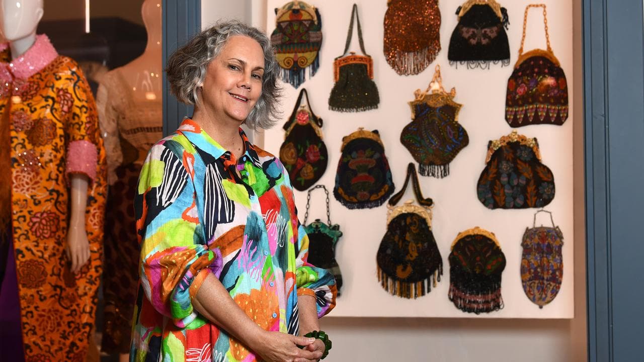 Lizzie Hilburger with her personal collection of beaded antique purses