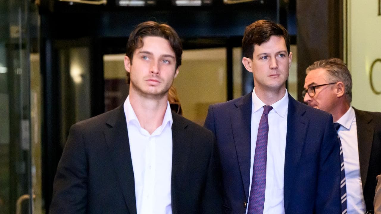 Rory Amon (centre) and brother