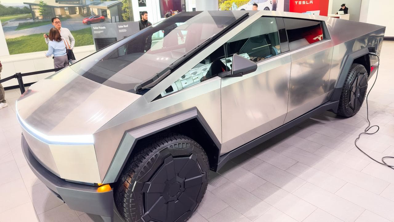 A Tesla Cybertruck is seen at a Tesla retail location