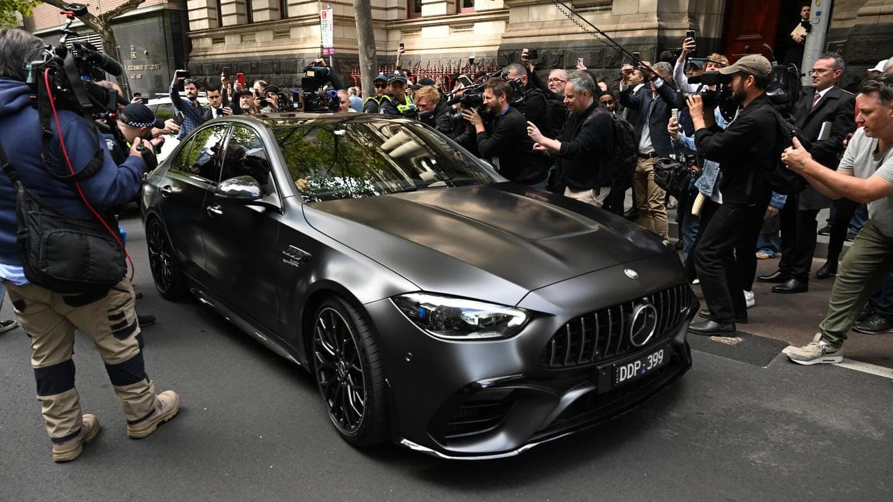 Tony Mokbel leaves court