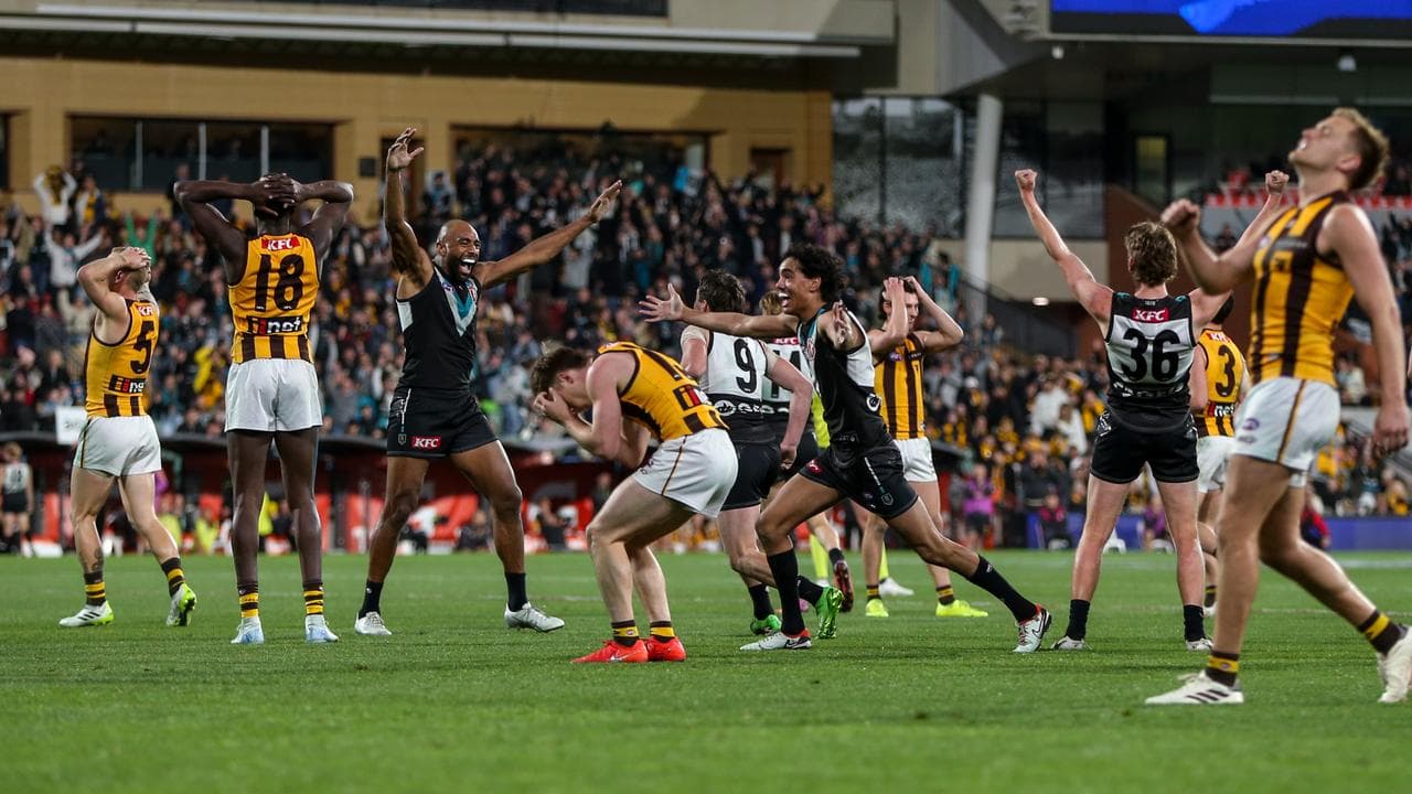 Port and Hawthorn players react after their 2024 semi final.