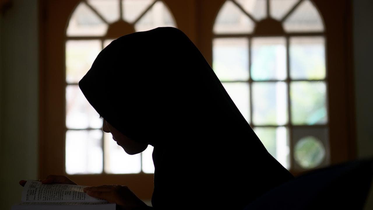 Student reads the Koran at an Islamic school