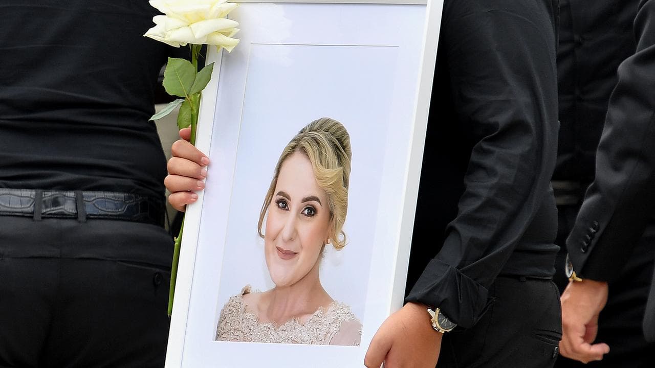 A photo of crash victim Vanessa Tadros is seen during her funeral