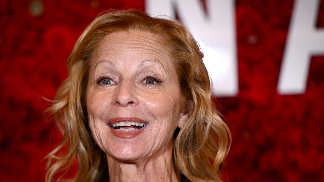 Heather Mitchell poses for a photograph on the red carpet