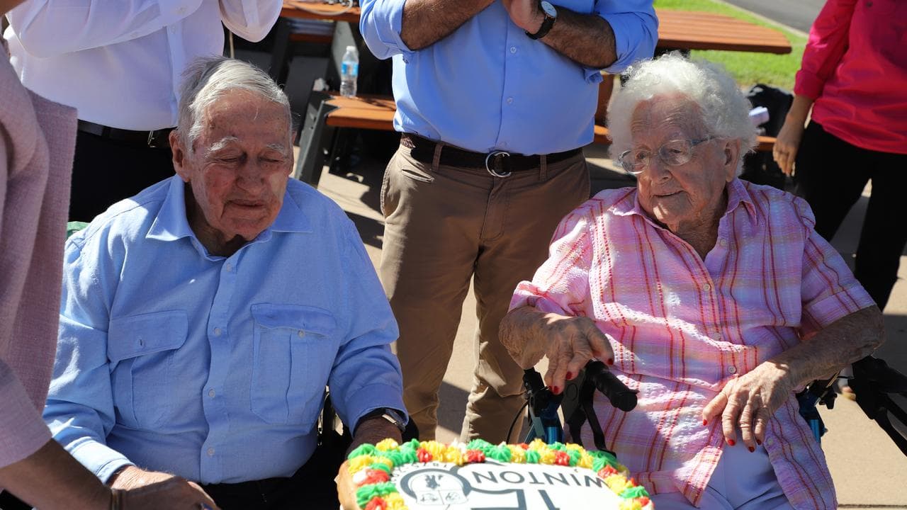 Winton's oldest resident Eileen Ryan, 99, and John East, 95 cut a cake