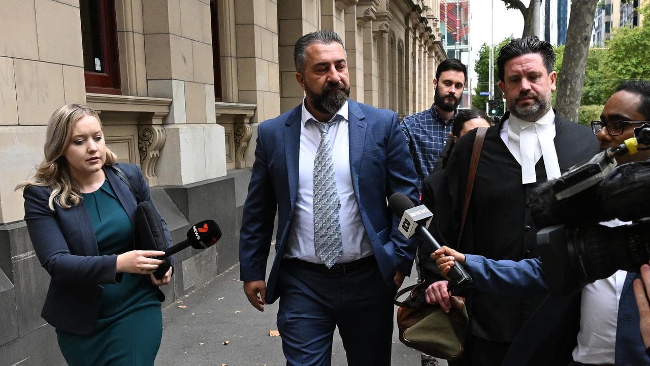 Laith Hanna (2nd left, file)