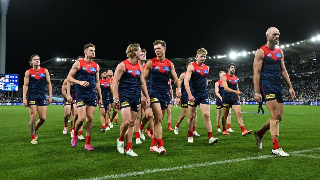 Disappointed Melbourne Demons players.