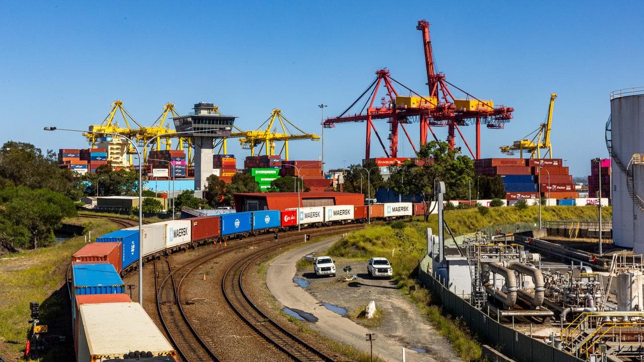 Shipping containers and a freight train at Port Botany