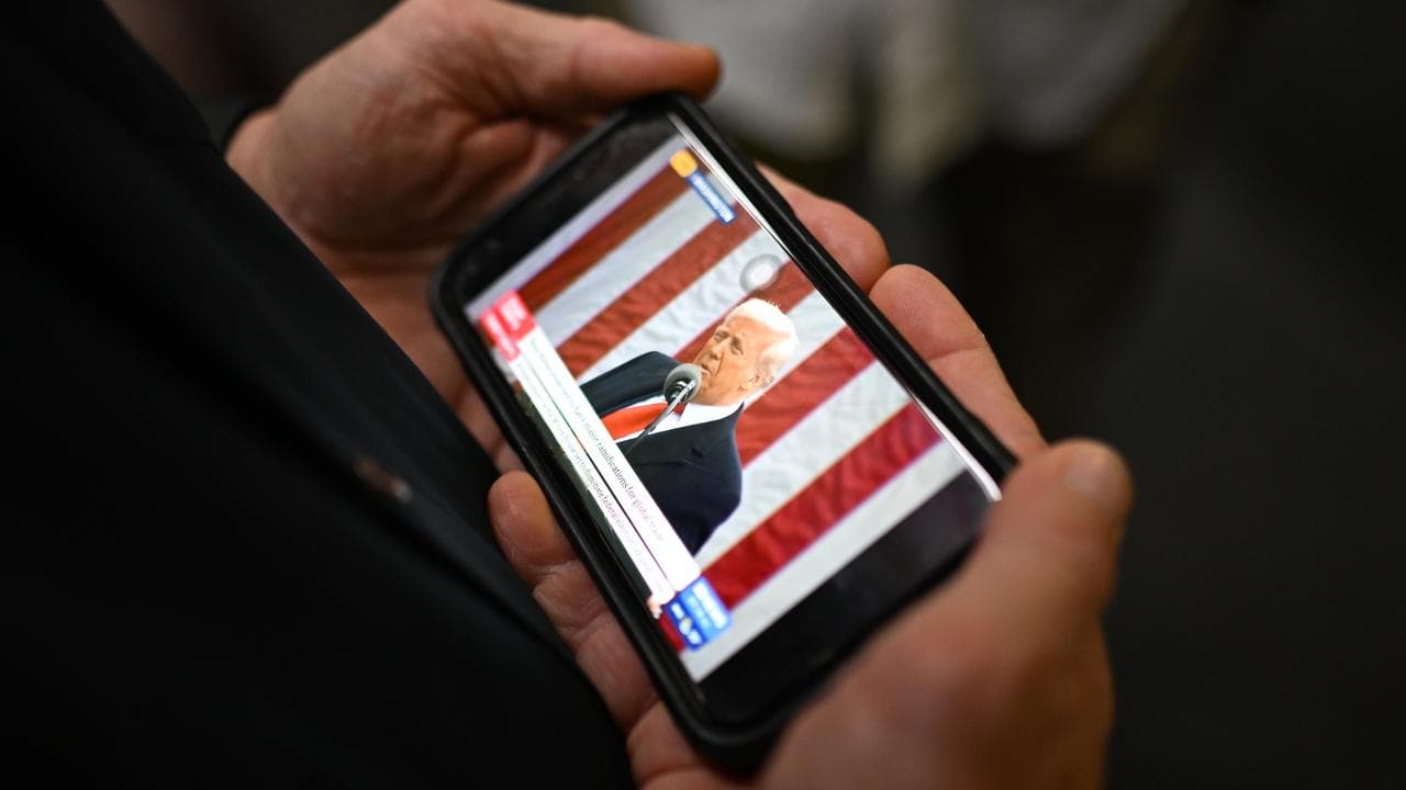 Donald Trump on a phone screen