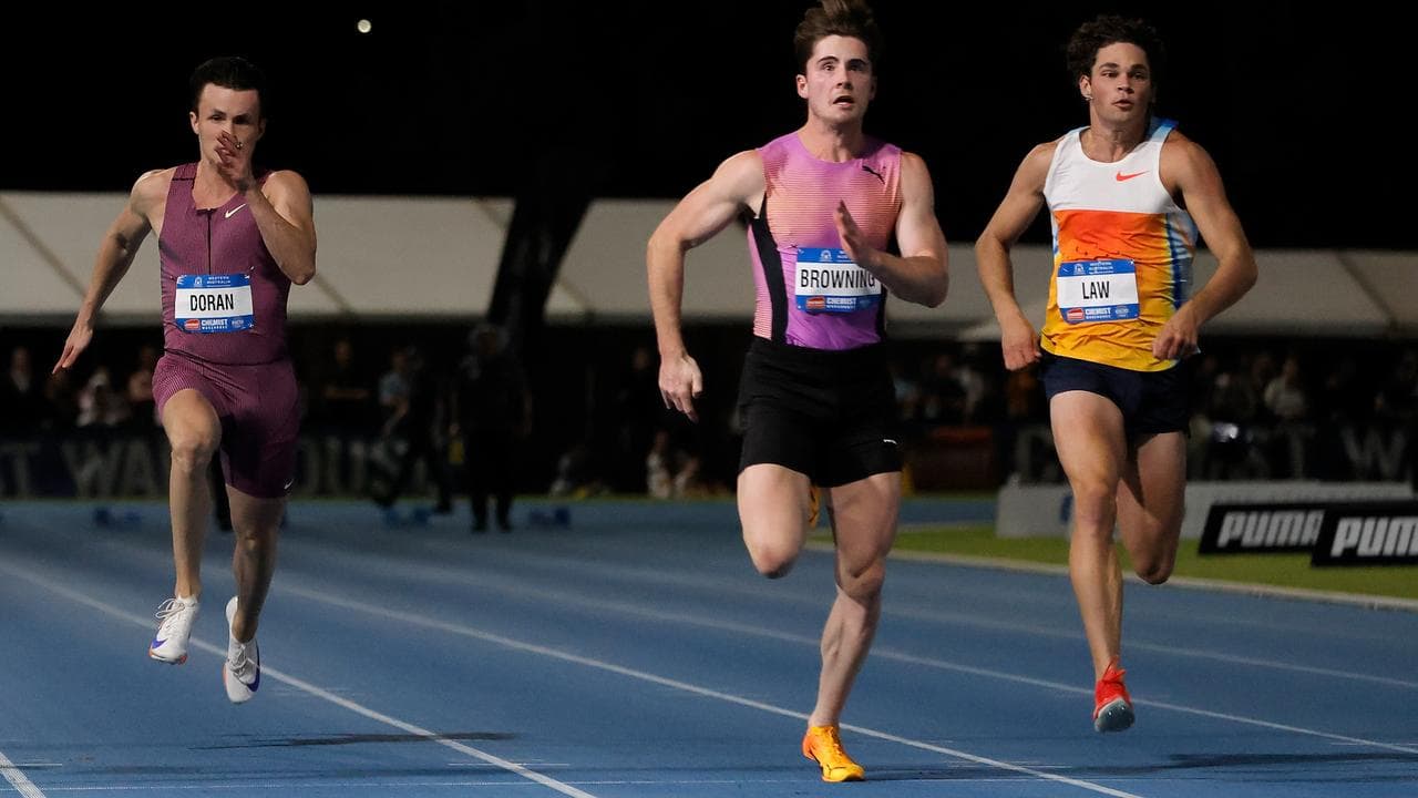 Browning crosses the line to post his 100m final victory.