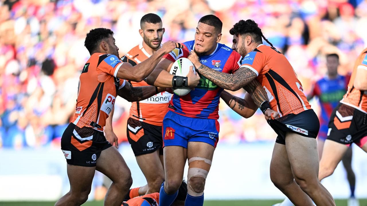 Newcastle's Leo Thompson (centre) wasn't given any freedom.