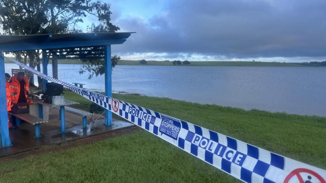 Police tape during the search of a dam in Queensland.