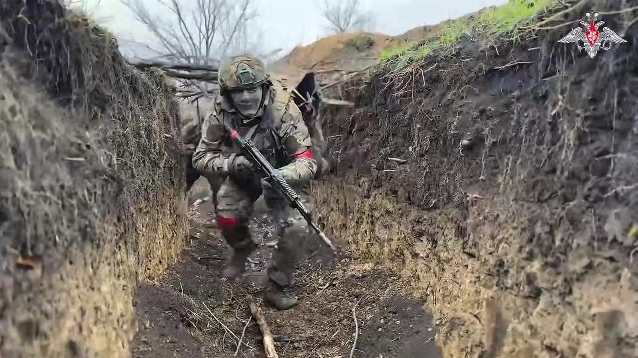 Russian servicemen attend a combat training for assault units