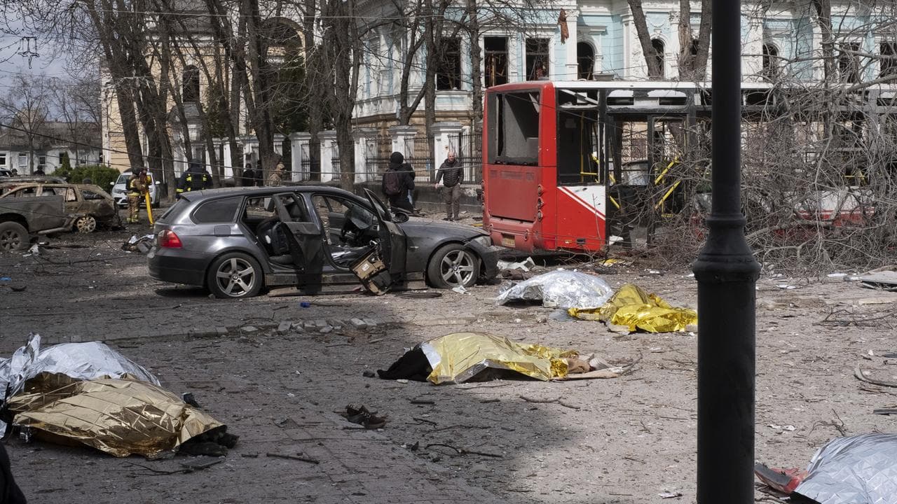 Dead bodies lie on the ground after a Russian missile strike on Sumy