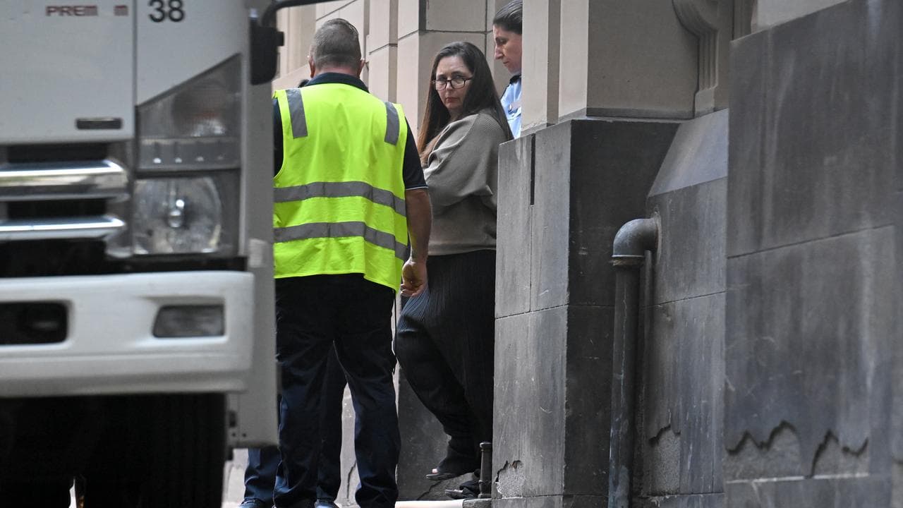 Erin Patterson (centre) departs from the Supreme Court of Victoria