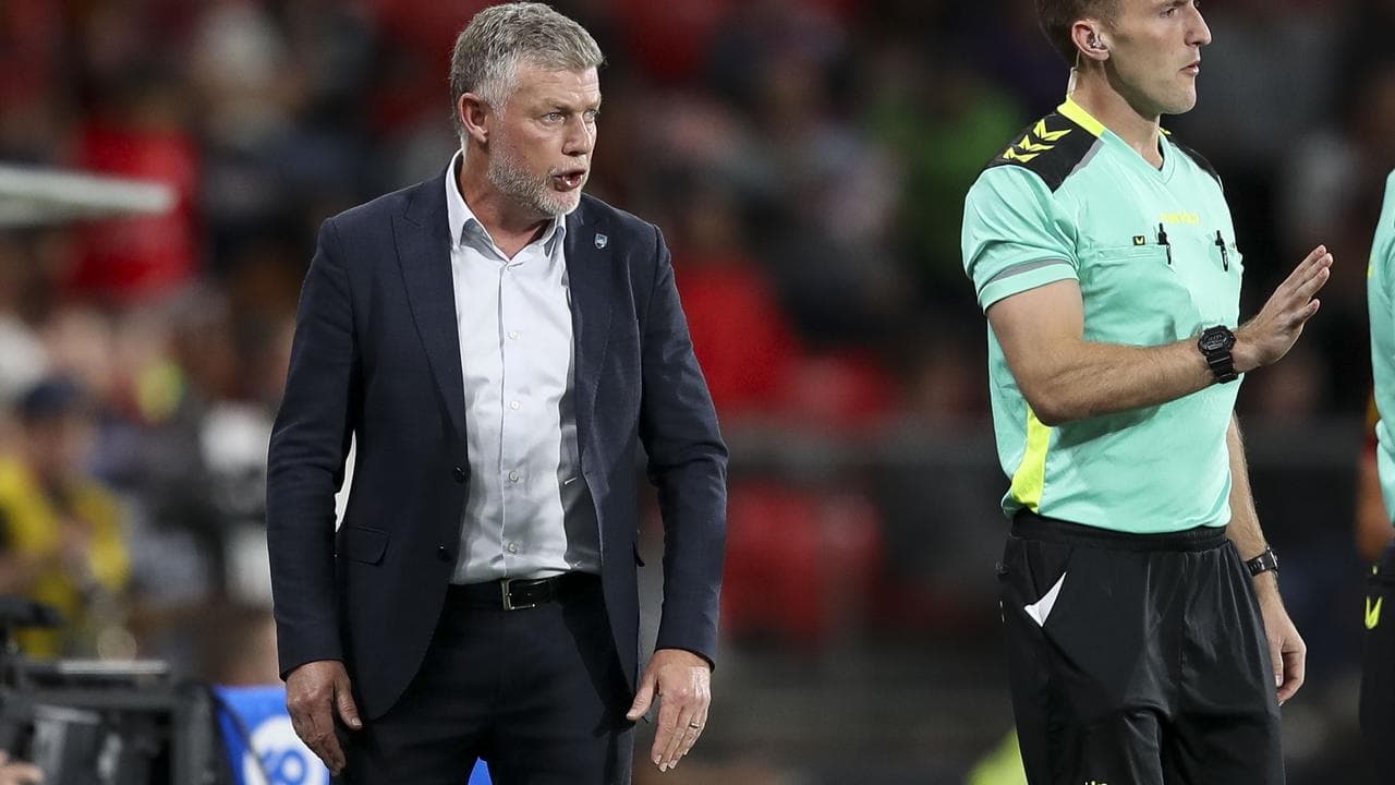 Coach Ufuk Talay (left)