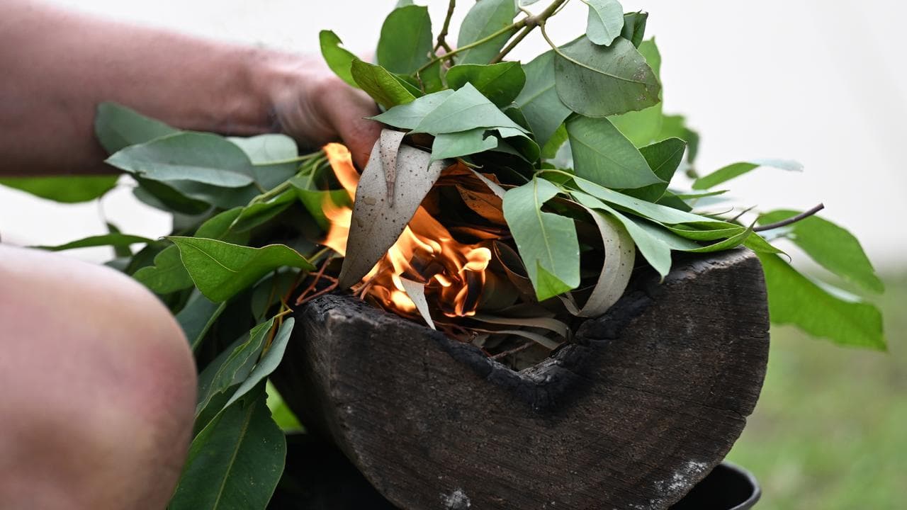 Fire and gum leaves used in a smoking ceremony (file image)