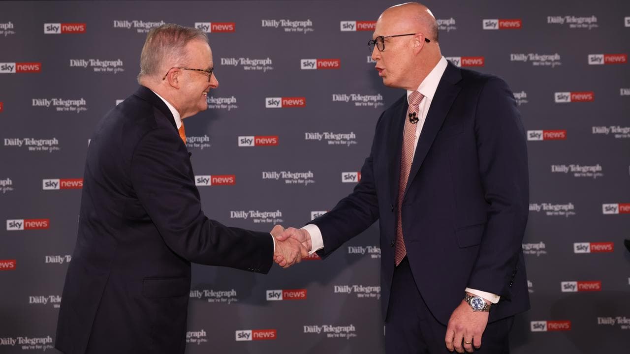 Anthony Albanese and Peter Dutton shake hands