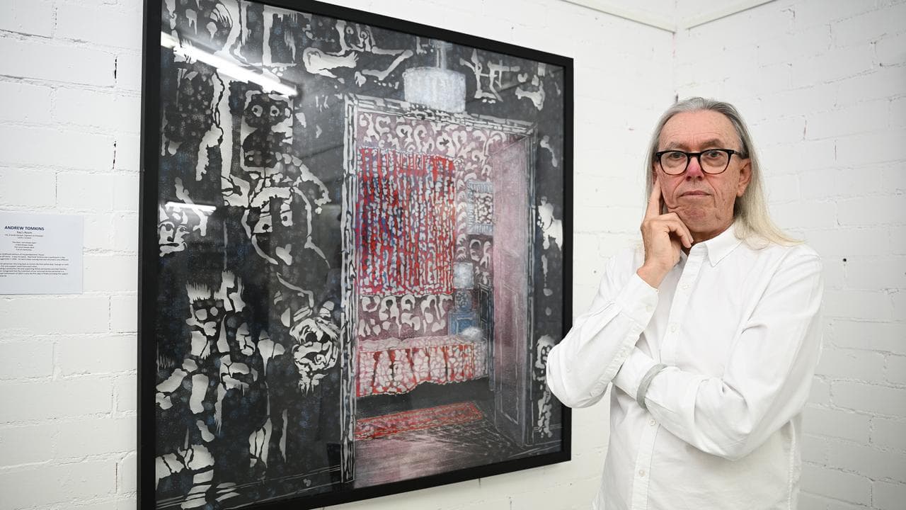 Andrew Tomkins poses for a photograph with his artwork Ray’s Room