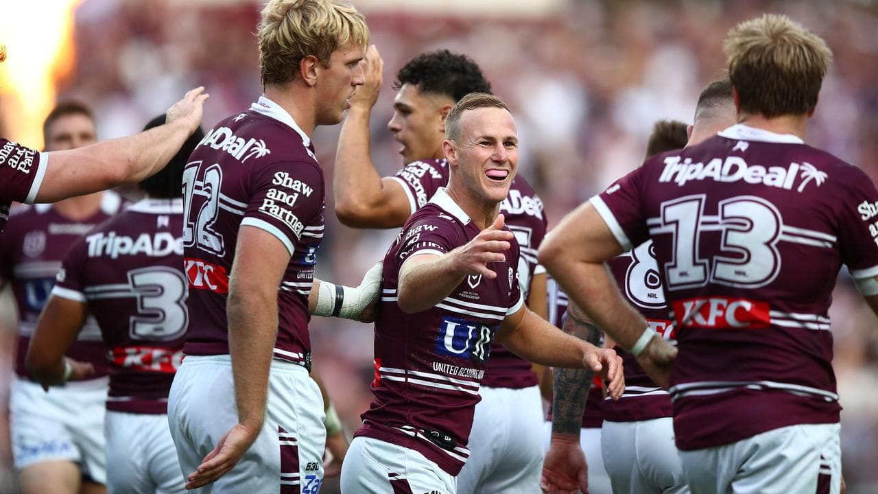 Daly Cherry-Evans (centre).