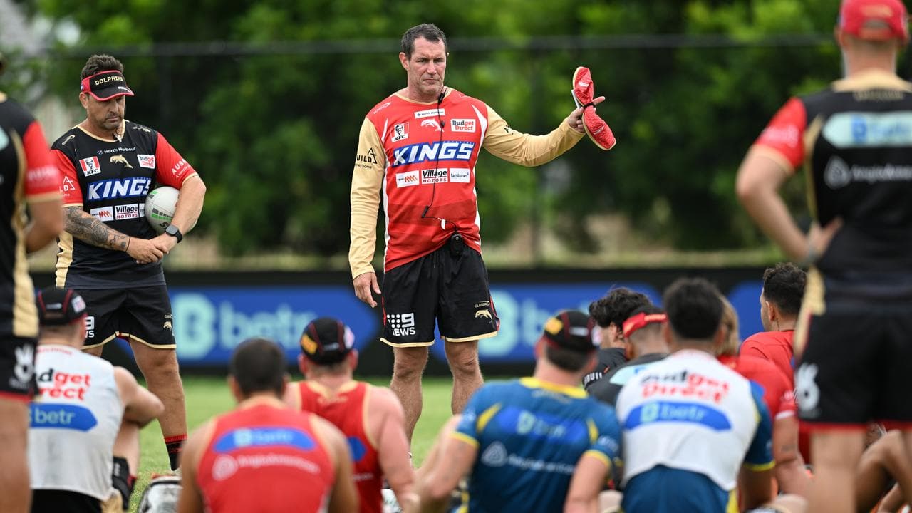 Dolphins coach Kristian Woolf (centre)