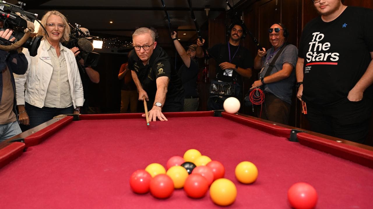 Anthony Albanese plays pool with students in Brisbane