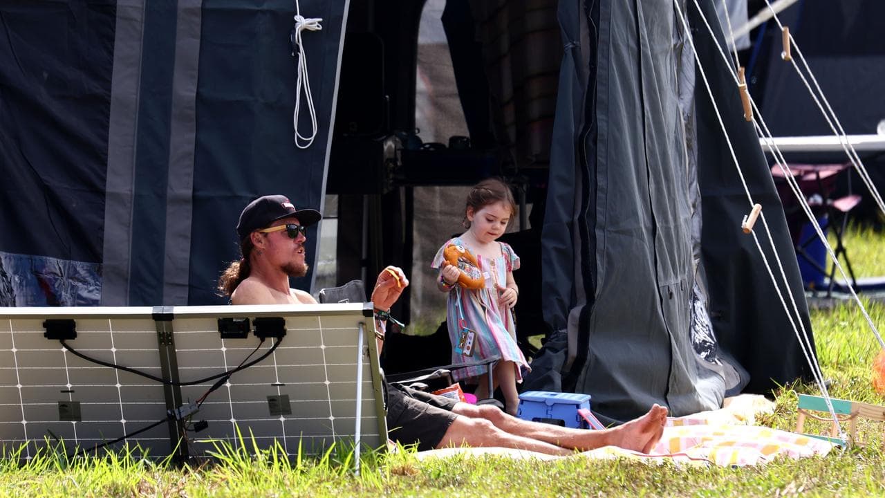 A family camping at the Bluesfest site