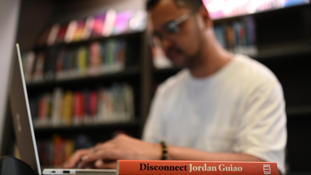 Author Jordan Guiao poses for a photograph