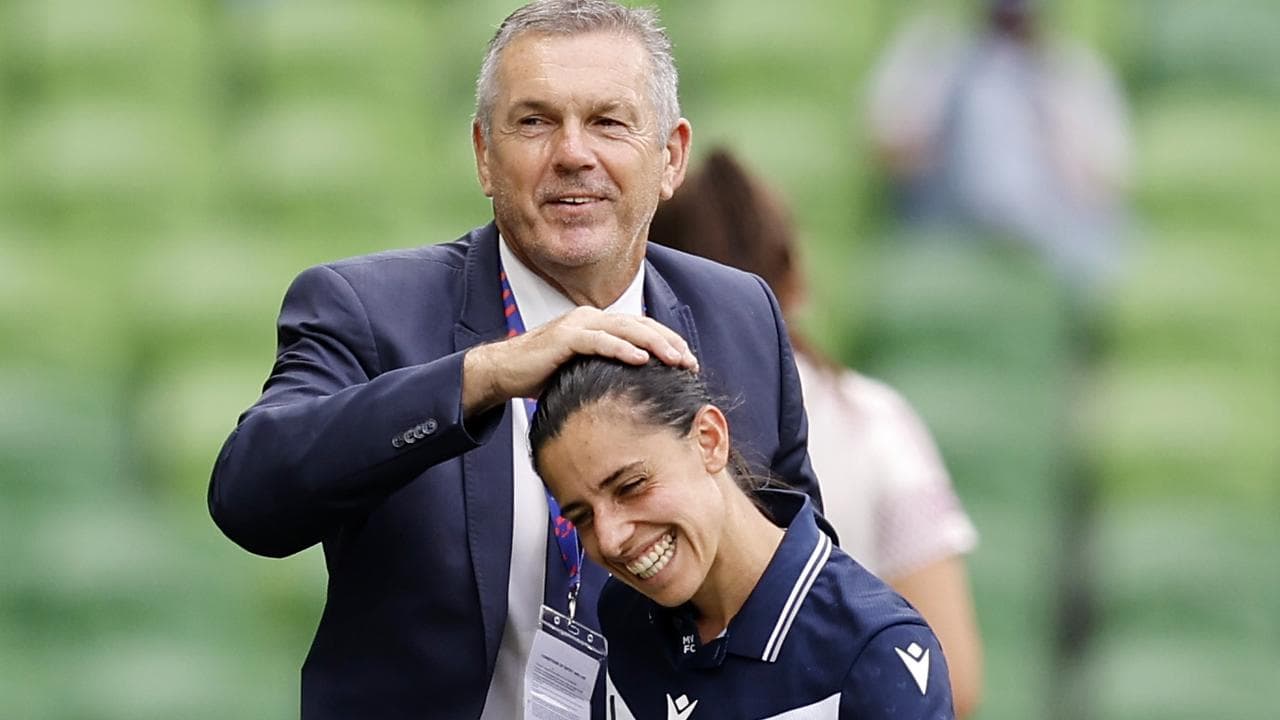 Jeff Hopkins congratulates Alexandra Chidiac on her goal.