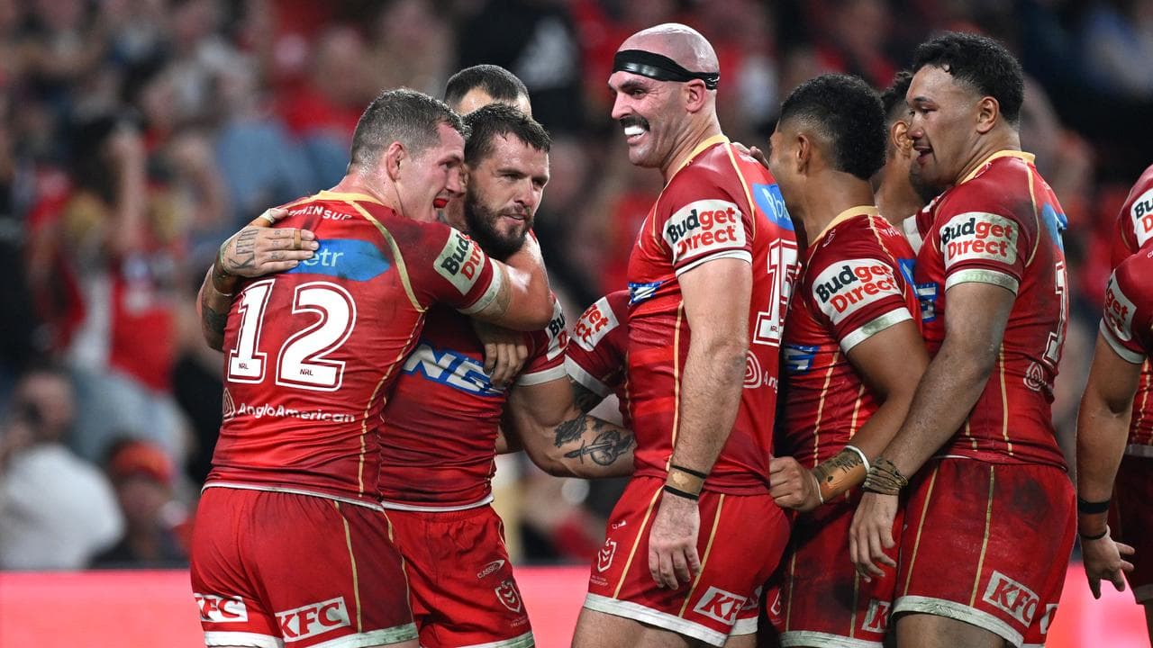 The Dolphins' Ray Stone (second left)