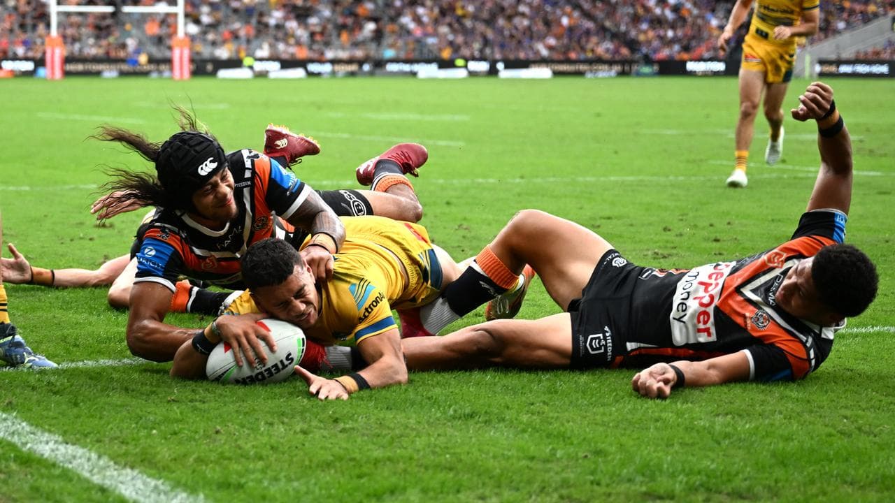 Isaiah Iongi of the Eels scores a try