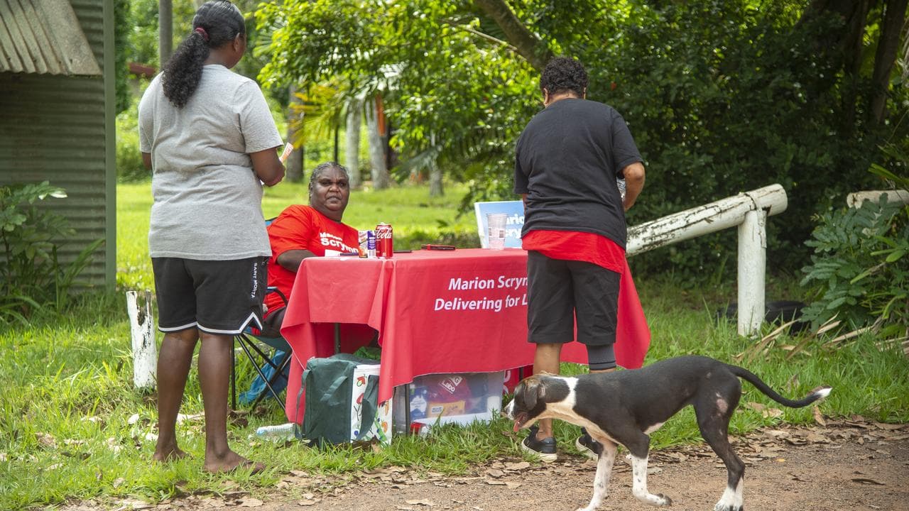 How-to-vote volunteers at a remote polling station.