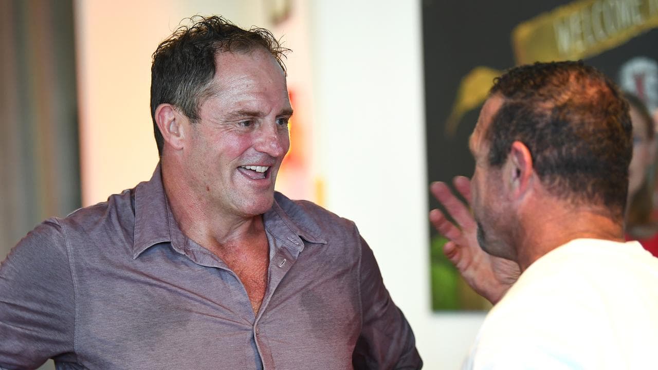 Billy Moore looks on