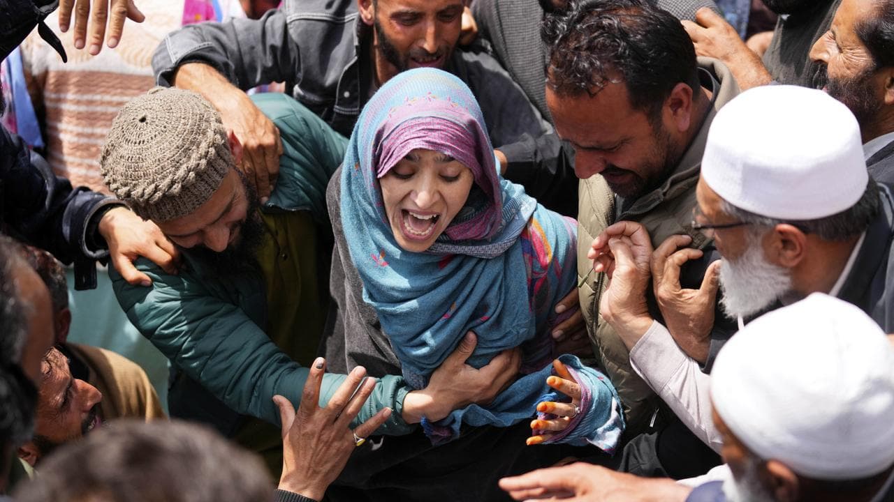 Relative during the funeral of a person killed by militants in Kashmir