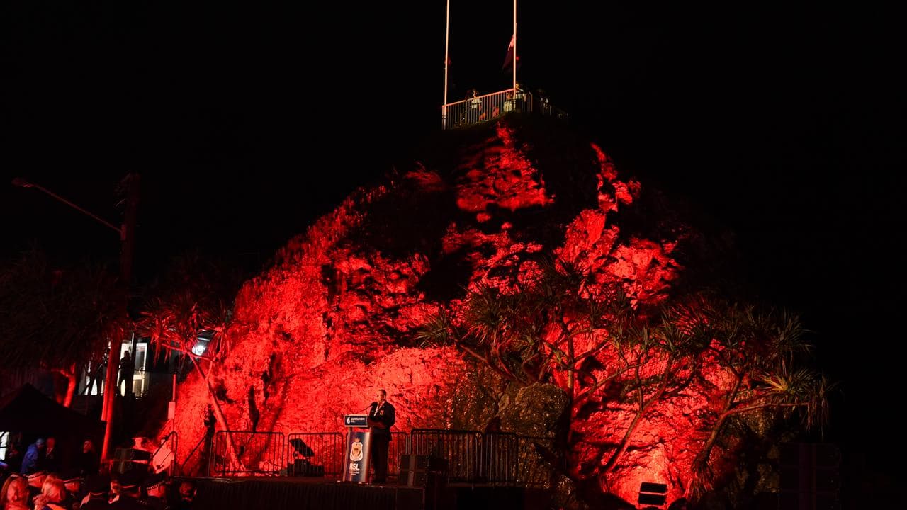 Flags are seen on Elephant Rock at the Anzac Day dawn service
