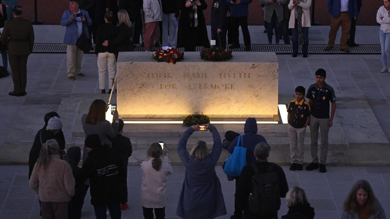 Members of the public attend the ANZAC Day dawn service in Canberra