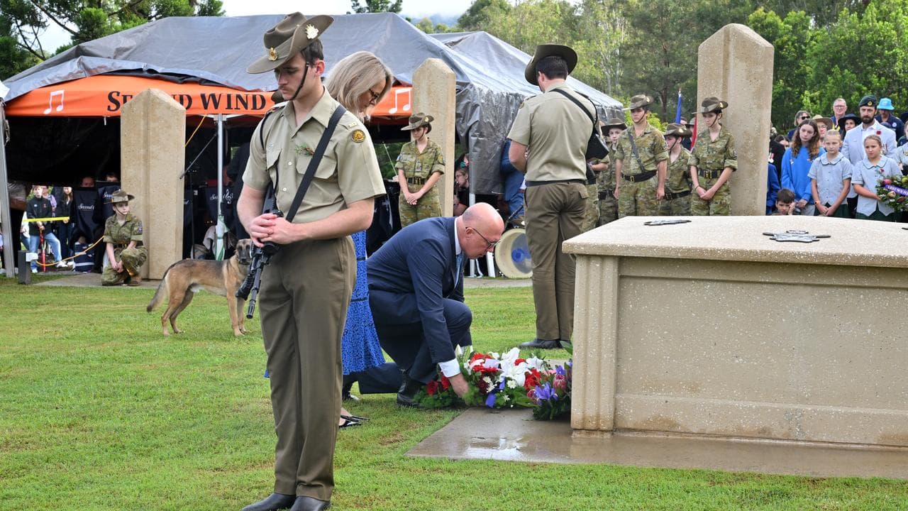 Peter Dutton and wife Kirilly laying a wreath at an Anzac Day service.
