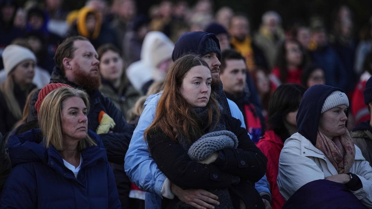 People at the dawn memorial service at the Anzac Cove beach