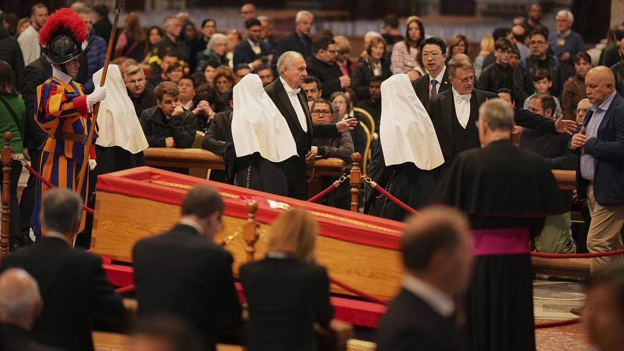 People pay respect to Pope Francis in St Peter's Basilica