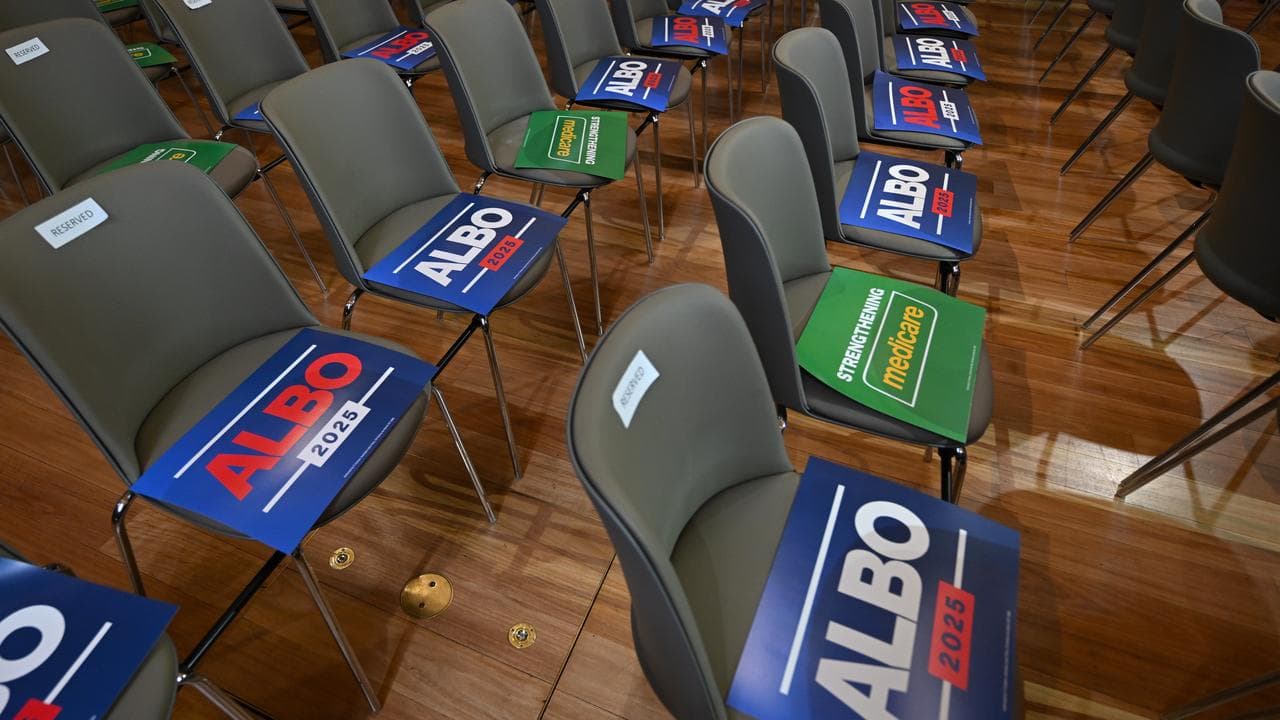 Campaign posters on seats at Parramatta Town Hall