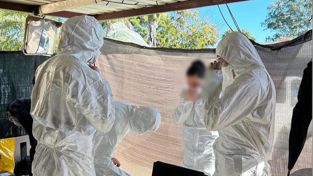 Police execute a synthetic opioid bust.