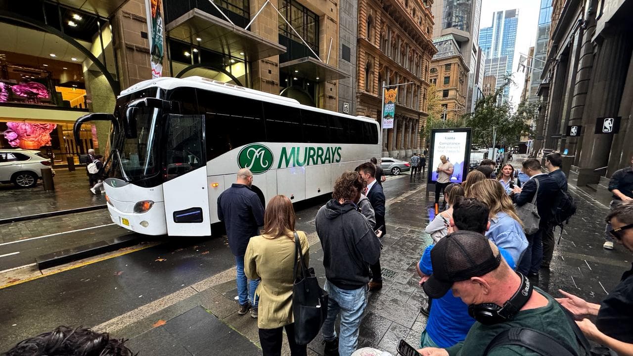 A bus carrying the media hit a bike lane barrier